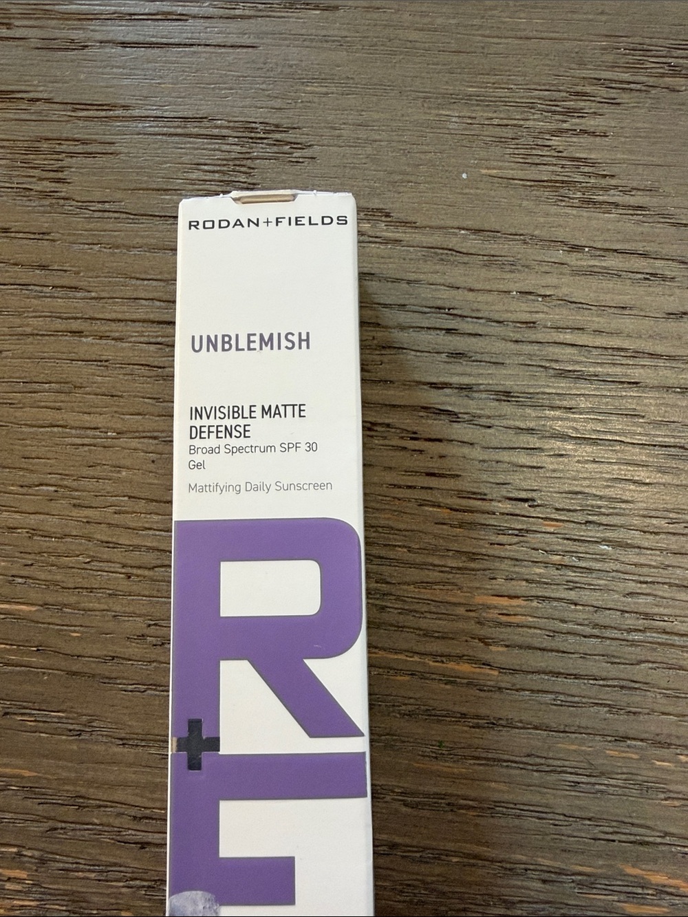 Rodan + Fields Unblemish Invisible Matte Defense Sunscreen - Purple & White